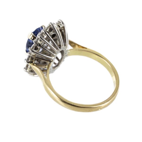 Bague marquise avec saphir et entourage diamants