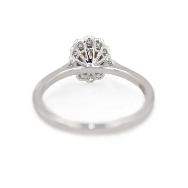 Bague marguerite ovale diamants serti feston