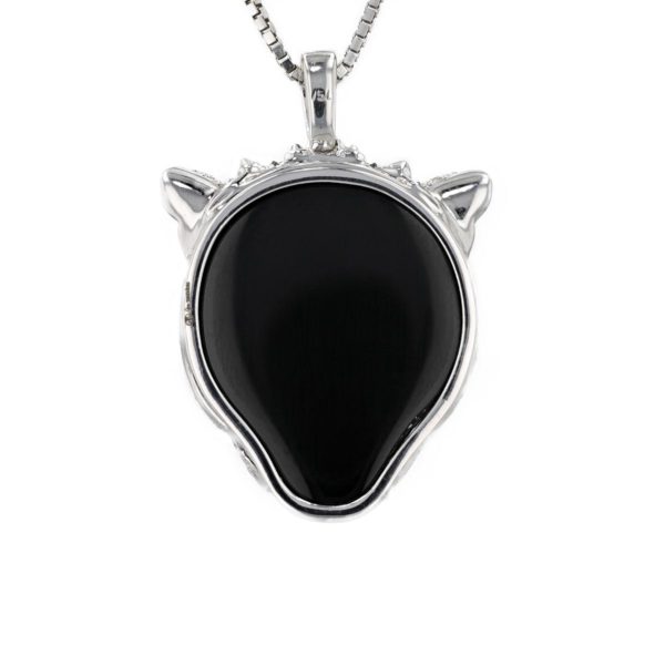 Pendentif guépard onyx, pavage diamants et yeux en tsavorites