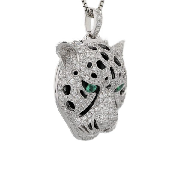 Pendentif guépard onyx, pavage diamants et yeux en tsavorites