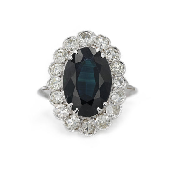 Bague saphir entourage diamants serti feston