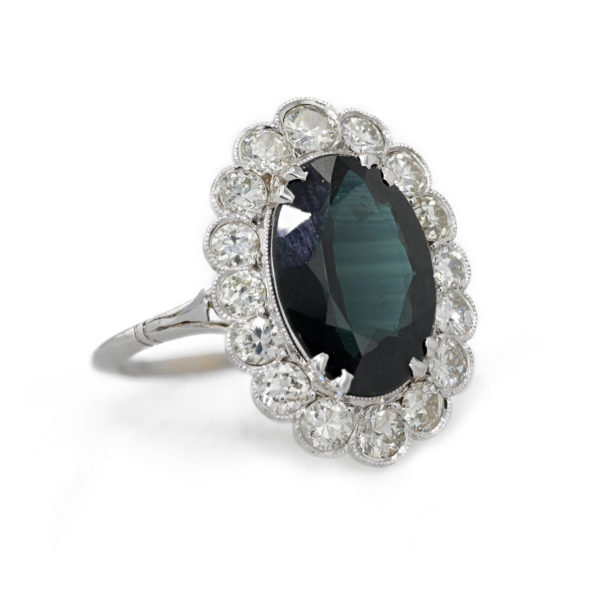 Bague saphir entourage diamants serti feston