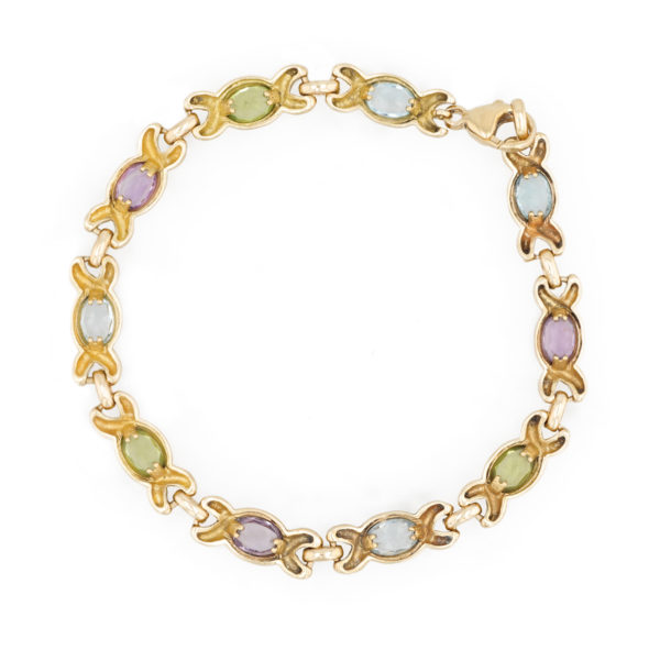 Bracelet multi pierres fines en or jaune 18 carats.