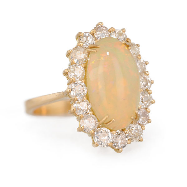 Bague marguerite opale entourage diamants