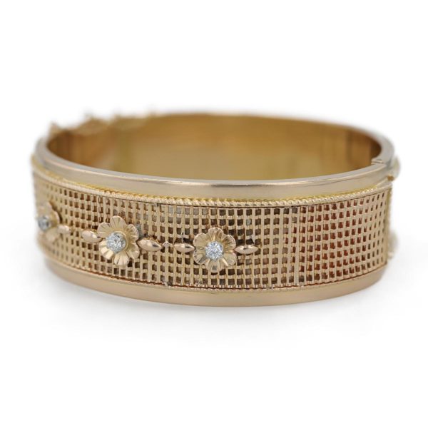 Bracelet manchette rigide strié 3 motifs fleurs et diamants