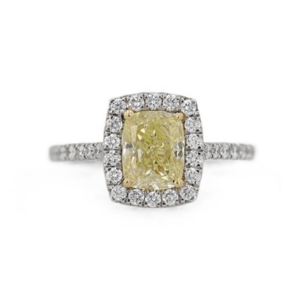 Bague marguerite diamant jaune entourage diamants blancs