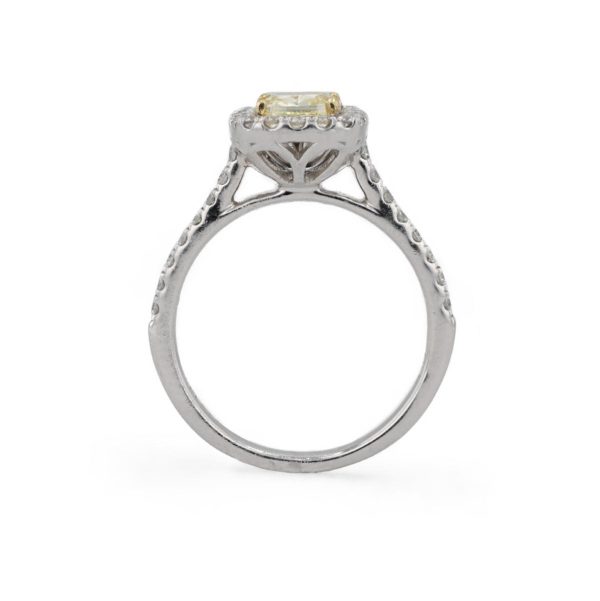 Bague marguerite diamant jaune entourage diamants blancs