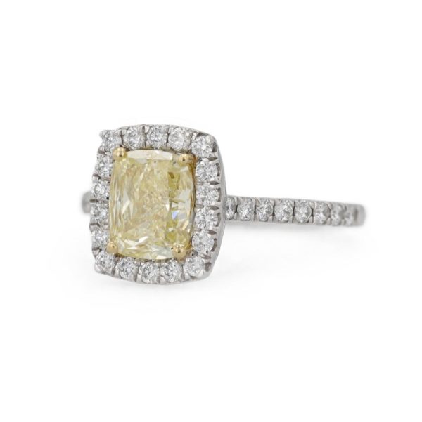 Bague marguerite diamant jaune entourage diamants blancs