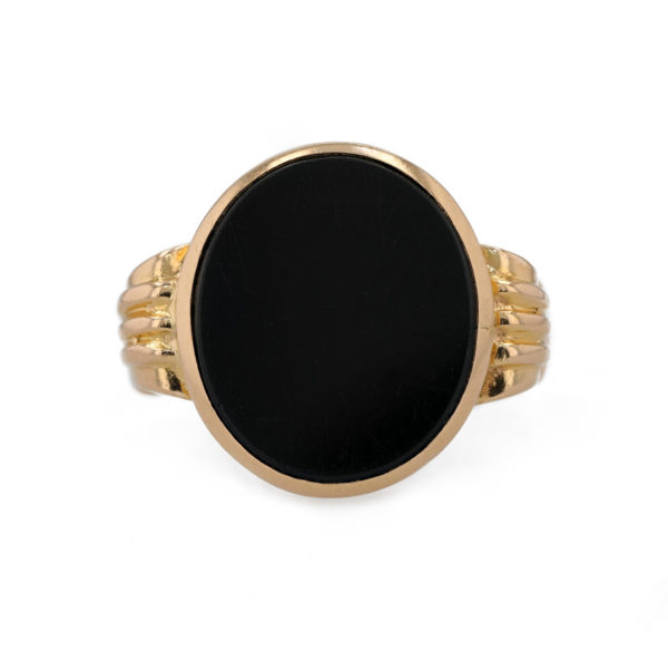 Bague ancienne onyx motif godron en serti clos