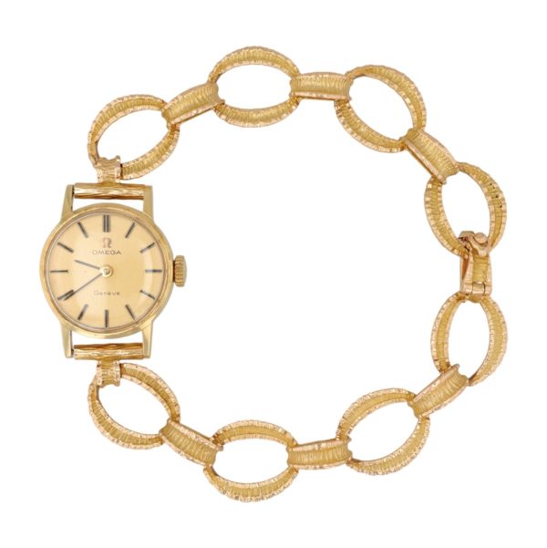 Montre OMEGA vintage en or jaune 18 carats