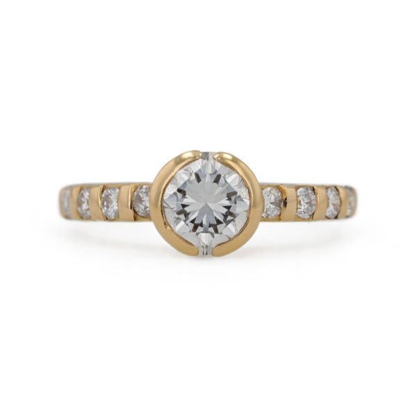 Bague solitaire diamants et lignes de diamants en or jaune 18 carats