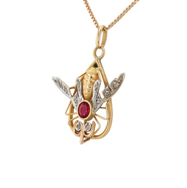 Pendentif insecte pierre rouge et diamants en or jaune 18 carats