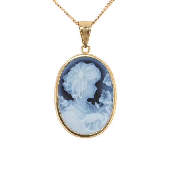 Pendentif camée bleu agate sur plaque d'onyx en or jaune 18 carats